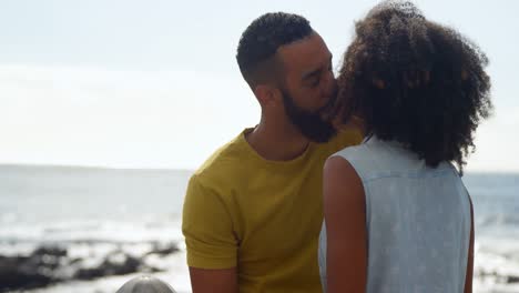 Couple-kissing-each-other-at-beach-4k