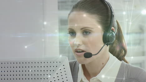 Animation-of-network-of-connections-over-businesswoman-using-phone-headsets