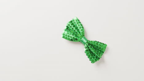 Video-of-st-patrick's-green-bow-tie-with-copy-space-on-white-background
