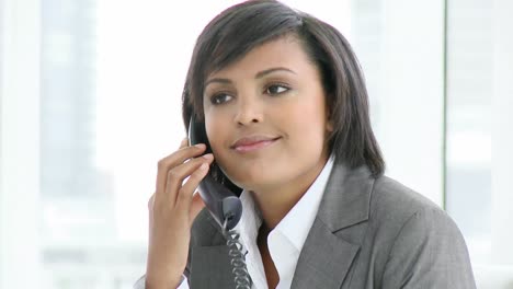 Panorama-of-AfroAmerican-businesswoman-talking-on-phone