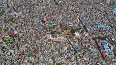 Drone-shot-Basantapur-Durbar-Square,-UNESCO-World-Heritage-Site-crowded-city-in-Kathmandu-Nepal