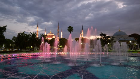 Sultanahmet-water-fountains-illuminated-at-night-with-Blue-mosque-Istanbul