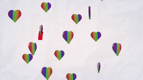 Animation-of-rainbow-hearts-over-white-background