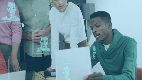 Animation-of-profile-icons-on-african-american-man-with-document-discussing-with-diverse-colleagues