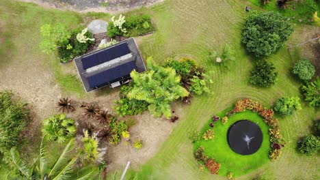 Birds-eye-view-of-off-grid-water-catchment-tank-and-solar-power-building