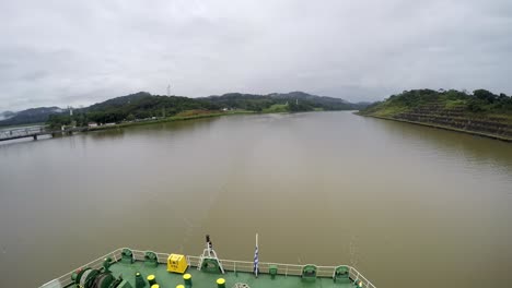 Timelapse-oil-tanker-crossing-transit-panama-canal-stern-view-tug-boat-Miraflores