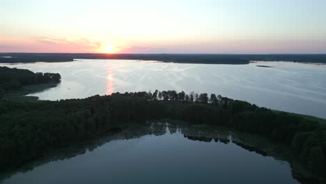 Panoramic-aerial-view-of-the-lake-during-sunrise