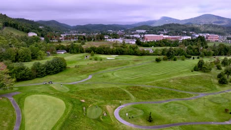 aerial-fast-pass-over-the-clubhouse-and-the-boone-golf-course-in-boone-nc,-north-carolina
