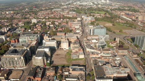 Dolly-back-aerial-shot-over-central-Slough-town-high-street