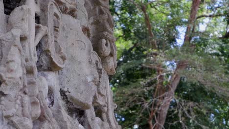 Close-detail:-Carved-stone-face-of-Mayan-king-at-Copan-ruin,-Honduras