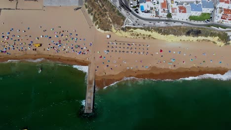 Drone-shot-of-large-beach-twisting