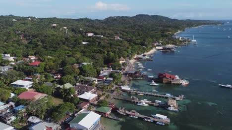 Aerial-flyover:-Roatan-Honduras,-tourism-destination-in-Caribbean-sea