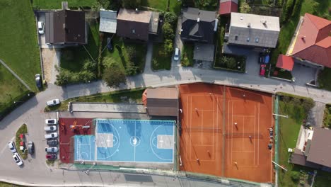 Aerial-headshot-of-sports-facilities-in-residential-complex-in-Lasko-town,-Slovenia