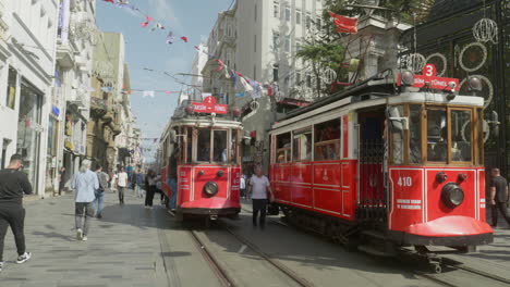 Istanbul-city-iconic-electric-red-public-trams-pass-on-Istiklal-street