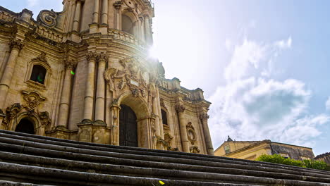 Timelapse-of-Cathedral-of-Saint-George,-Low-angled-View,-Sunburst