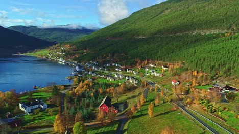 A-Rustic-Mountainous-Village-Landscape-With-A-Forest-And-A-Lake-In-Norway