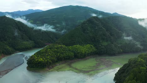 Aerial-View-of-Kurose-River-and-Mountains-landscape-of-Ehime,-Japan