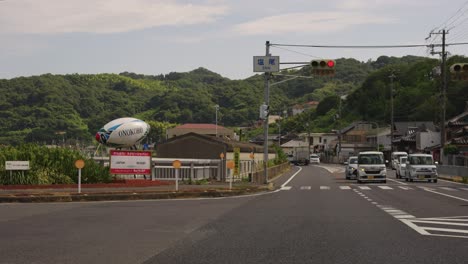 Japanese-Roads-through-Awaji-Island,-Waiting-at-Stop-Sign-at-Intersection