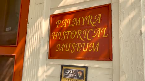Slow-push-in-on-the-sign-of-the-museum-near-Downtown-Palmyra-New-York