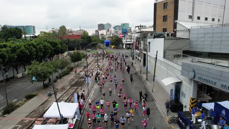 lateral-drone-shot-of-mexico-city-marathon-at-Polanco-zone