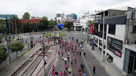 drone-shot-of-mexico-city-marathon-near-railroad-track