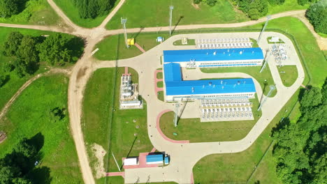 Aerial-footage-of-the-natural-gas-station-situated-within-the-green-area