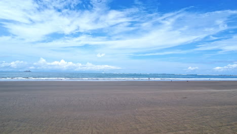 Empty-remote-tropical-beach-at-the-pacific-coastline-in-Nature-reserve-in-Costa-Rica