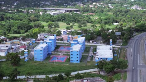 Sideways-aerial-of-big-cell-blocks-of-a-Jail-in-the-Caribbean-Dominican-republic