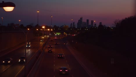 Toronto-skyline-timelapse-of-cars-driving-through-the-city-at-night