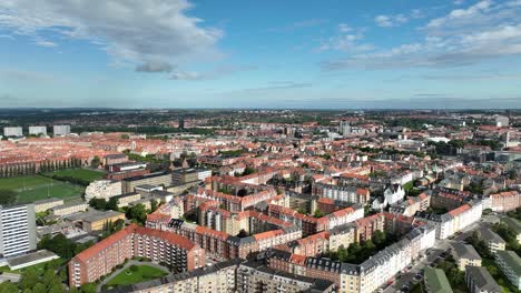 Dense-residential-are-at-Frederiksbjerg-and-Aarhus-c-area-in-Denmark---Backward-moving-cityscape-aerial-Aarhus