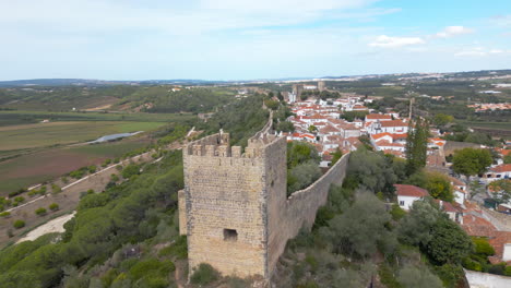 Aerial-view-surrounding-the-walls-of-Óbidos-Castle