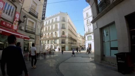 Madrid,-Spain:-Lose-yourself-in-the-vibrant-rhythm-of-Madrid-as-you-explore-Gran-Via,-with-our-gimbal-shot-making-you-feel-like-you're-right-there