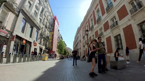 Spain,-Experience-the-sensory-overload-of-Madrid's-Gran-Via-with-a-gimbal-shot-that-captures-the-essence-of-this-bustling-street
