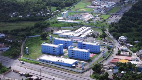 Large,-modern-jail-with-four-prison-buildings,-aerial-orbit,-Dominican-republic
