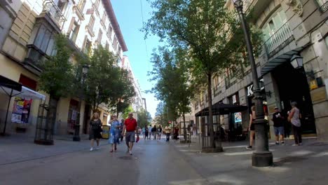 Spain,-Embark-on-a-captivating-visual-journey-through-the-vibrant-streets-of-Madrid,-where-our-amazing-shot-of-Gran-Via-and-other-bustling-avenues-in-the-heart-of-the-city-comes-to-life