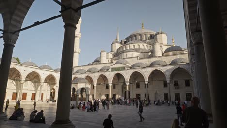 People-gather-in-the-Blue-mosque-courtyard-to-visit-tourist-attraction