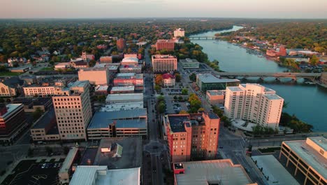 Sliding-aerial-at-sunet-revealing-beautiful-downtown-Rockford-Illinois-from-America