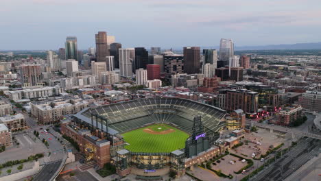 Push-In-Drone-Shot-Of-Downtown-Denver-and-Coors-Field-at-Dusk