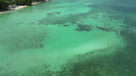 Aerial-Flyover-Showcasing-The-Beautiful-Pristine-Lagoon-In-Koh-Phangan,-Thailand