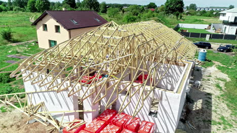 Aerial-footage-of-under-construction-house-being-built-adjutant-to-another-house