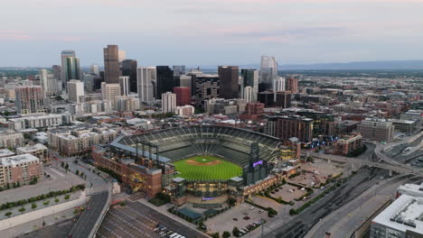 Orbit-Drone-Shot-Of-Downtown-Denver-and-Coors-Field-at-Dusk