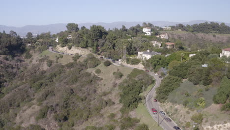 4K-drone-shot-of-rush-hour-traffic-on-Benedict-Canyon-in-Beverly-Hills-California