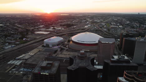 Drone-shot-tracking-in-front-of-the-Mercedes-Benz-Superdome,-in-New-Orleans,-USA