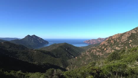 Panoramic-view-of-Scandola-UNESCO-nature-reserve-in-summer-season,-Corsica-island-in-France
