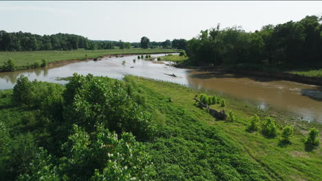 Vegetation-And-Flowing-Stream-With-Canoe-Boat-Over-Illinois-River-In-Arkansas,-USA