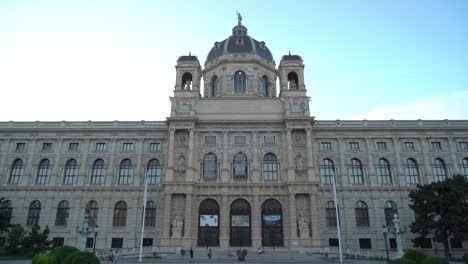 Main-Entrance-of-Kunsthistorisches-Museum-Wien-with-People-Walking-Around-at-Dusk