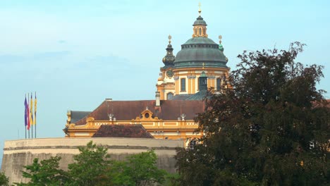 Green-Dome-of-Melk-Abbey-with-Flags-Waving-in-the-Wind