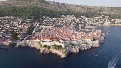 Aerial:-Dubrovnik-Old-Town---Medieval-marvel-with-limestone-mountains-and-Adriatic-view