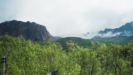 A-Serene-Scene-of-Beautiful-Landscaping-in-Kvaenan,-Norway---Aerial-Pan-Up