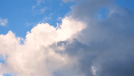 Cumulonimbus-Clouds-Against-Blue-Sky-In-Daytime